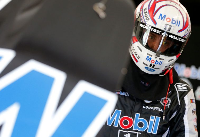RICHMOND, VIRGINIA - SEPTEMBER 20: Kevin Harvick, driver of the #4 Mobil 1 Ford, stands in the garage area during practice for the Monster Energy NASCAR Cup Series Federated Auto Parts 400 at Richmond Raceway on September 20, 2019 in Richmond, Virginia. (Photo by Brian Lawdermilk/Getty Images) | Getty Images
