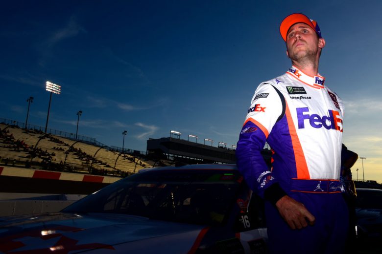 RICHMOND, VIRGINIA - SEPTEMBER 20: Denny Hamlin, driver of the #11 FedEx Office Toyota, stands on the grid during qualifying for the Monster Energy NASCAR Cup Series Federated Auto Parts 400 at Richmond Raceway on September 20, 2019 in Richmond, Virginia. (Photo by Jared C. Tilton/Getty Images) | Getty Images