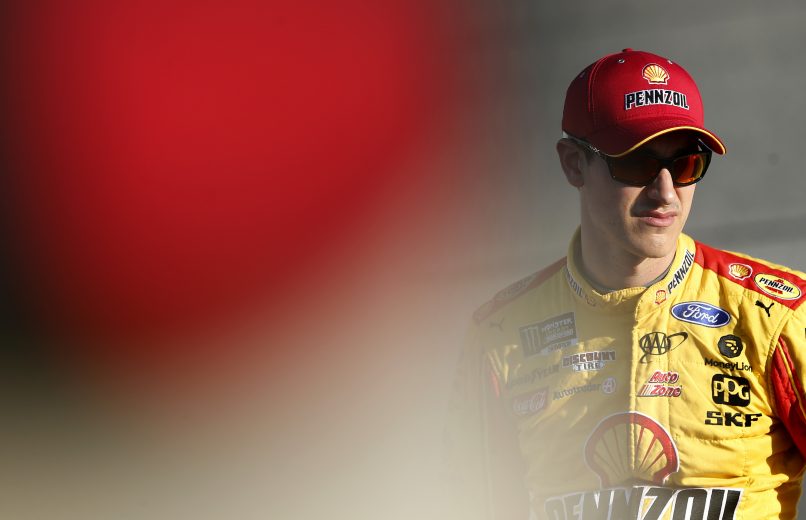 RICHMOND, VIRGINIA - SEPTEMBER 20: Joey Logano, driver of the #22 Shell Pennzoil Ford, looks on during qualifying for the Monster Energy NASCAR Cup Series Federated Auto Parts 400 at Richmond Raceway on September 20, 2019 in Richmond, Virginia. (Photo by Brian Lawdermilk/Getty Images) | Getty Images