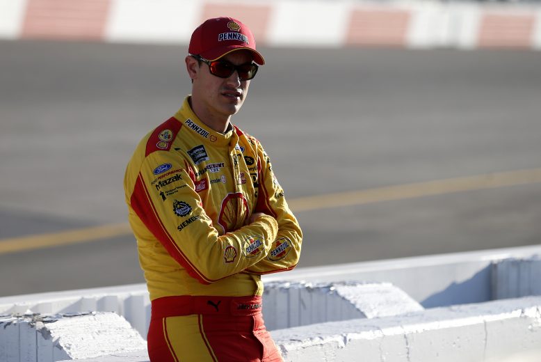 RICHMOND, VIRGINIA - SEPTEMBER 20: Joey Logano, driver of the #22 Shell Pennzoil Ford, stands on the grid during qualifying for the Monster Energy NASCAR Cup Series Federated Auto Parts 400 at Richmond Raceway on September 20, 2019 in Richmond, Virginia. (Photo by Brian Lawdermilk/Getty Images) | Getty Images