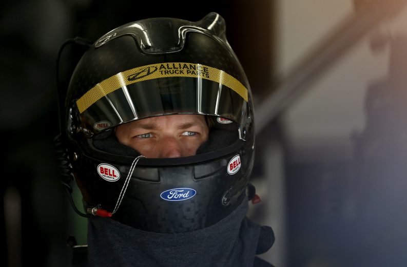 CHARLOTTE, NORTH CAROLINA - SEPTEMBER 27: Brad Keselowski, driver of the #2 Alliance Truck Parts Ford, stands in the garage area during practice for the Monster Energy NASCAR Cup Series Bank of America ROVAL 400 at Charlotte Motor Speedway on September 27, 2019 in Charlotte, North Carolina. (Photo by Brian Lawdermilk/Getty Images) | Getty Images