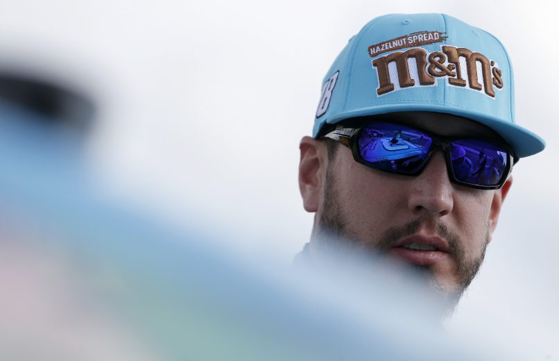 CHARLOTTE, NORTH CAROLINA - SEPTEMBER 27: Kyle Busch, driver of the #18 M&M's Hazelnut Toyota, stands on the grid during qualifying for the Monster Energy NASCAR Cup Series Bank of America ROVAL 400 at Charlotte Motor Speedway on September 27, 2019 in Charlotte, North Carolina. (Photo by Brian Lawdermilk/Getty Images) | Getty Images