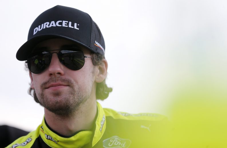 CHARLOTTE, NORTH CAROLINA - SEPTEMBER 27: Ryan Blaney, driver of the #12 Menards/Duracell Ford, stands on the grid during qualifying for the Monster Energy NASCAR Cup Series Bank of America ROVAL 400 at Charlotte Motor Speedway on September 27, 2019 in Charlotte, North Carolina. (Photo by Brian Lawdermilk/Getty Images) | Getty Images