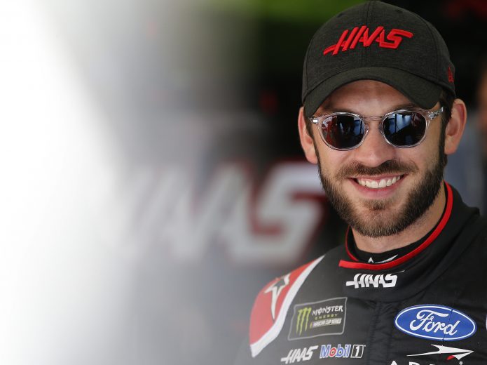 CHARLOTTE, NORTH CAROLINA - SEPTEMBER 28: Daniel Suarez, driver of the #41 Haas Automation Ford, stands in the garage area during practice for the Monster Energy NASCAR Cup Series Bank of America ROVAL 400 at Charlotte Motor Speedway on September 28, 2019 in Charlotte, North Carolina. (Photo by Brian Lawdermilk/Getty Images) | Getty Images