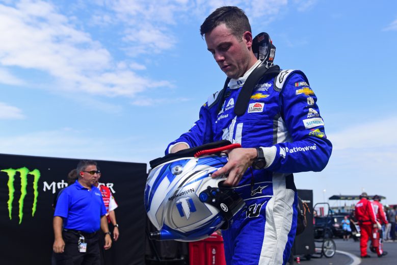 CHARLOTTE, NORTH CAROLINA - SEPTEMBER 28: Alex Bowman, driver of the #88 Nationwide Retirement Plans Chevrolet, walks through the garage area after being involved in an on-track incident during practice for the Monster Energy NASCAR Cup Series Bank of America ROVAL 400 at Charlotte Motor Speedway on September 28, 2019 in Charlotte, North Carolina. (Photo by Jared C. Tilton/Getty Images) | Getty Images