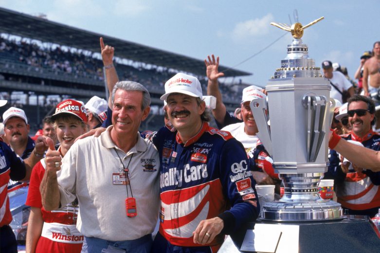 INDIANAPOLIS - 1996:  Dale Jarrett (R) and Ned Jarrett pose for a picture after Dale Jarrett won the Indianapolis 400 in Indianapolis, Indiana on August 3, 1996.  (Photo by Brian Bahr/Getty Images) | Getty Images