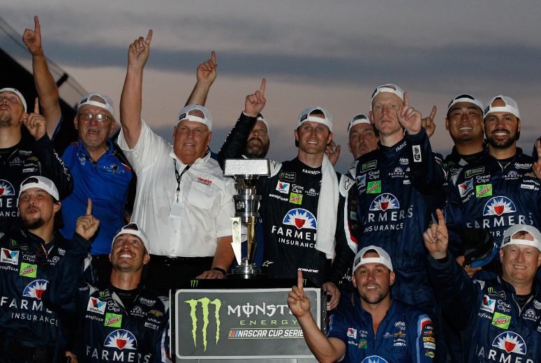 INDIANAPOLIS, IN - JULY 23:  Kasey Kahne, driver of the #5 Farmers Insurance Chevrolet, celebrates with team owner Rick Hendrick and his crew after winning the Monster Energy NASCAR Cup Series Brickyard 400 at Indianapolis Motorspeedway on July 23, 2017 in Indianapolis, Indiana.  (Photo by Brian Lawdermilk/Getty Images) | Getty Images