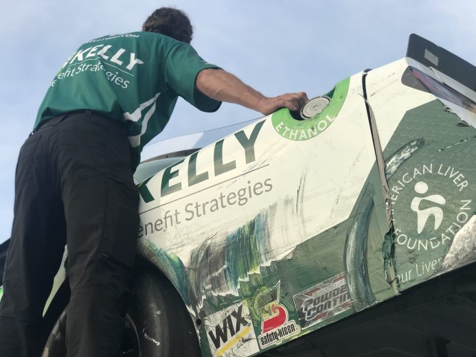 Left-rear fender scuffs as the No. 86 goes on the hauler.