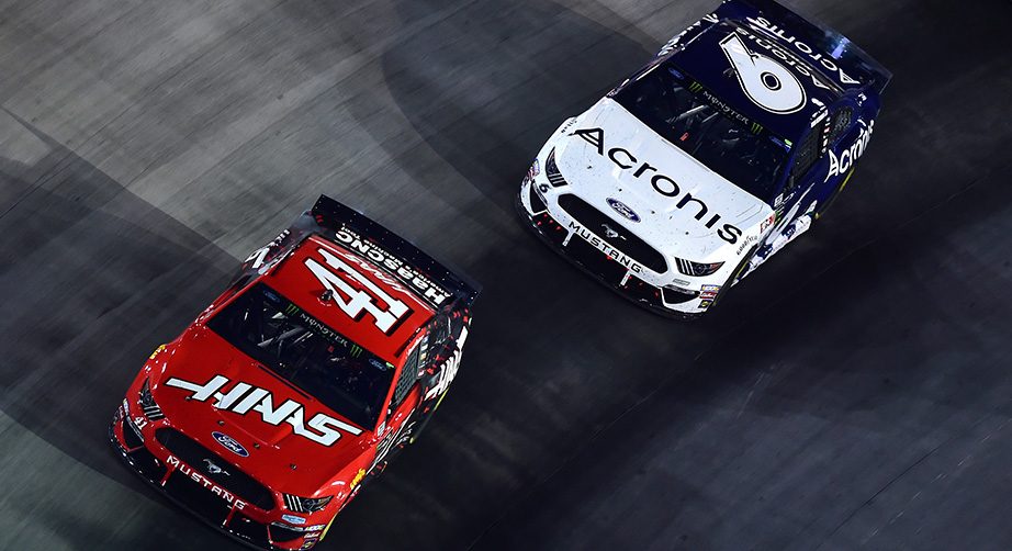 BRISTOL, TENNESSEE - AUGUST 17: Daniel Suarez, driver of the #41 Haas Automation Ford, leads Ryan Newman, driver of the #6 Acronis Ford, and Kyle Busch, driver of the #18 M&M's Toyota, during the Monster Energy NASCAR Cup Series Bass Pro Shops NRA Night Race at Bristol Motor Speedway on August 17, 2019 in Bristol, Tennessee. (Photo by Jared C. Tilton/Getty Images) | Getty Images