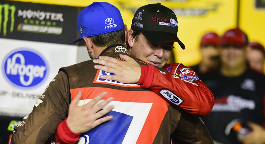 DARLINGTON, SOUTH CAROLINA - SEPTEMBER 02: Erik Jones, driver of the #20 Sport Clips Throwback Toyota, is congratulated by Kyle Busch, driver of the #18 Snickers Throwback Toyota, in Victory Lane after winning the Monster Energy NASCAR Cup Series Bojangles' Southern 500 at Darlington Raceway on September 02, 2019 in Darlington, South Carolina. (Photo by Jared C. Tilton/Getty Images) | Getty Images