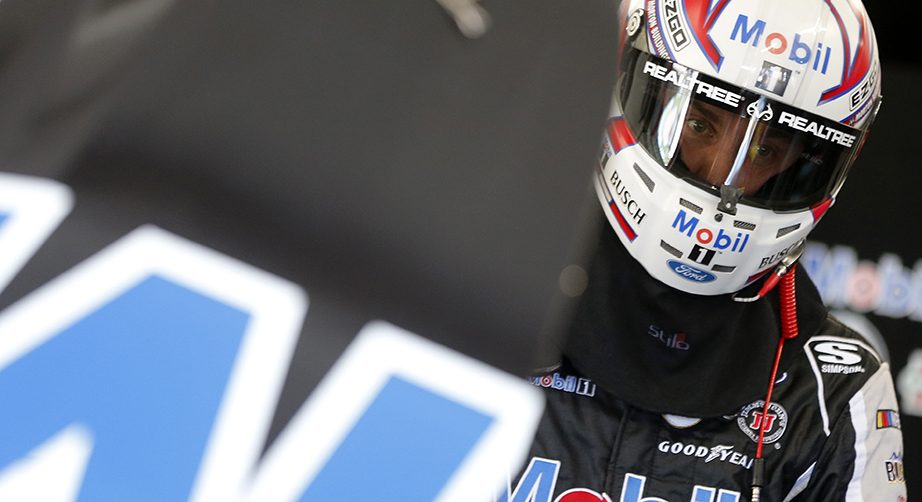 RICHMOND, VIRGINIA - SEPTEMBER 20: Kevin Harvick, driver of the #4 Mobil 1 Ford, stands in the garage area during practice for the Monster Energy NASCAR Cup Series Federated Auto Parts 400 at Richmond Raceway on September 20, 2019 in Richmond, Virginia. (Photo by Brian Lawdermilk/Getty Images) | Getty Images