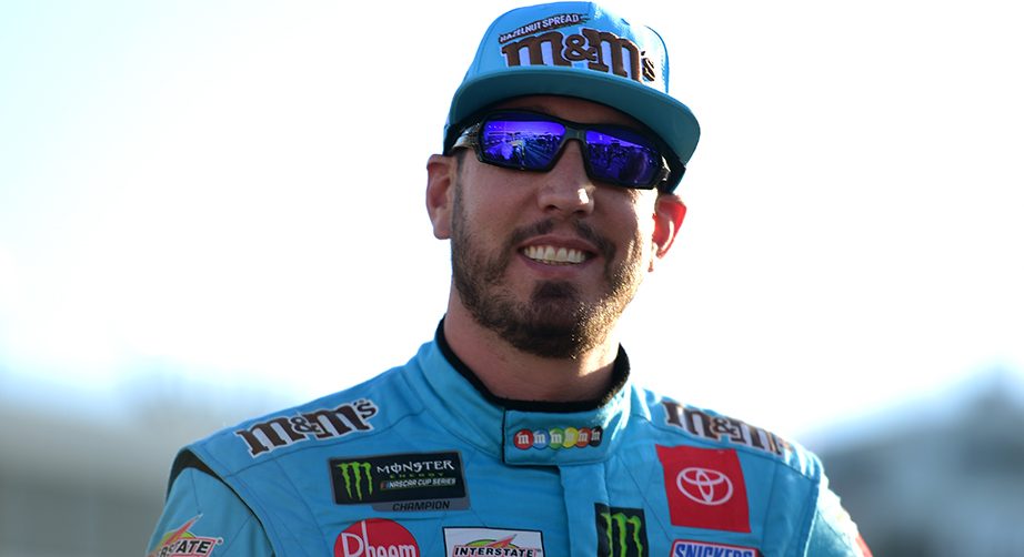 RICHMOND, VIRGINIA - SEPTEMBER 20: Kyle Busch, driver of the #18 M&M's Hazelnut Toyota, stands on the grid during qualifying for the Monster Energy NASCAR Cup Series Federated Auto Parts 400 at Richmond Raceway on September 20, 2019 in Richmond, Virginia. (Photo by Jared C. Tilton/Getty Images) | Getty Images