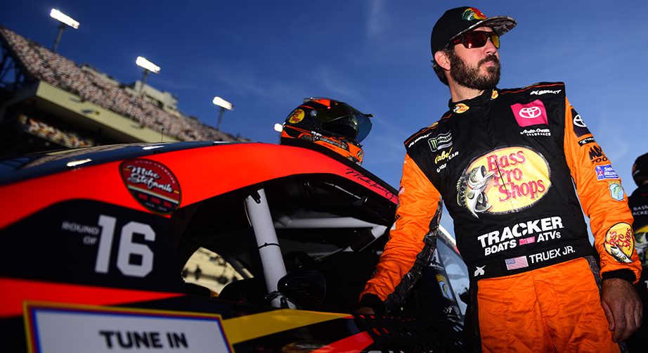 RICHMOND, VIRGINIA - SEPTEMBER 20: Martin Truex Jr., driver of the #19 Bass Pro Shops Toyota, stands on the grid during qualifying for the Monster Energy NASCAR Cup Series Federated Auto Parts 400 at Richmond Raceway on September 20, 2019 in Richmond, Virginia. (Photo by Jared C. Tilton/Getty Images) | Getty Images