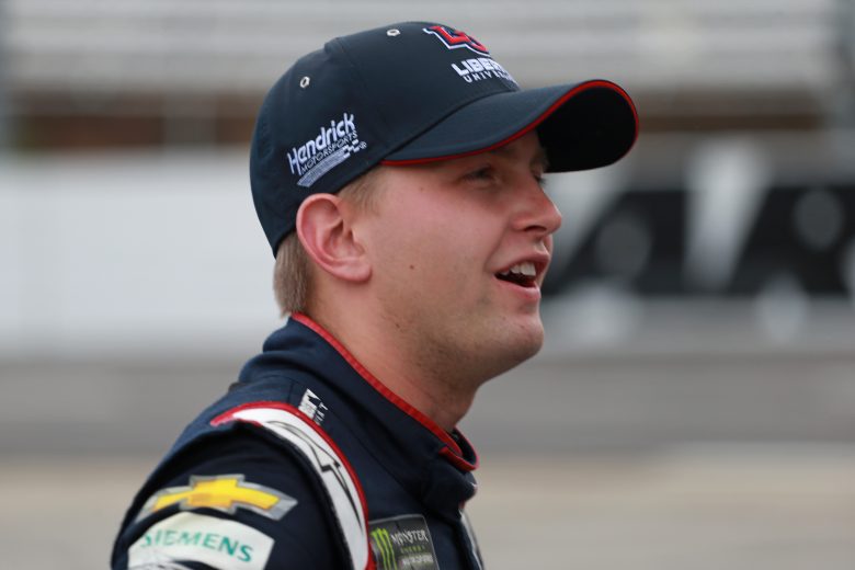 MARTINSVILLE, VIRGINIA - OCTOBER 26: William Byron, driver of the #24 Liberty University Chevrolet, stands by his car during qualifying for the Monster Energy NASCAR Cup Series First Data 500 at Martinsville Speedway on October 26, 2019 in Martinsville, Virginia. (Photo by Matt Sullivan/Getty Images) | Getty Images