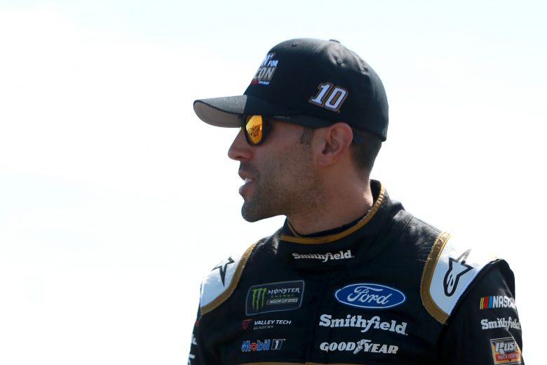 TALLADEGA, ALABAMA - OCTOBER 11: Aric Almirola, driver of the #10 Smithfield Racin' for Bacon Ford, walks through the garage area during practice for the Monster Energy NASCAR Cup Series 1000Bulbs.com 500 at Talladega Superspeedway on October 11, 2019 in Talladega, Alabama. (Photo by Sean Gardner/Getty Images) | Getty Images