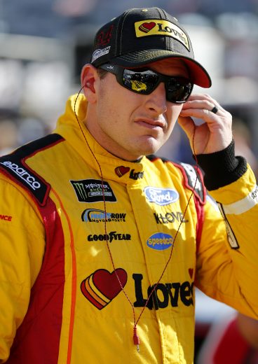 BRISTOL, TENNESSEE - AUGUST 16: Michael McDowell, driver of the #34 Love's Travel Stops Ford,stands on the grid during qualifying for the Monster Energy NASCAR Cup Series Bass Pro Shops NRA Night Race at Bristol Motor Speedway on August 16, 2019 in Bristol, Tennessee. (Photo by Brian Lawdermilk/Getty Images) | Getty Images