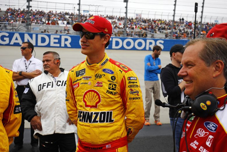 DOVER, DELAWARE - OCTOBER 06: Joey Logano, driver of the #22 Shell Pennzoil Ford, stands on the grid prior to the start of the Monster Energy NASCAR Cup Series Drydene 400 at Dover International Speedway on October 06, 2019 in Dover, Delaware. (Photo by Jeff Zelevansky/Getty Images)