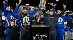 Andrew Ranger celebrates with his crew after clinching the NASCAR Pinty's Series title.