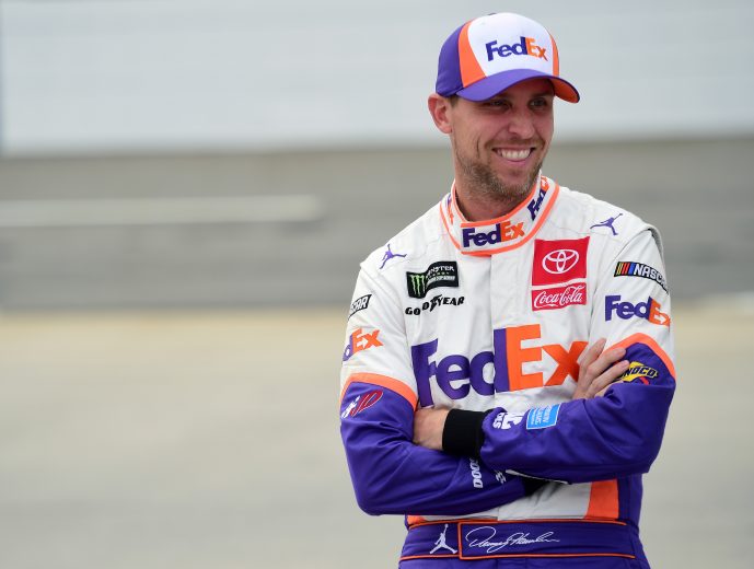 MARTINSVILLE, VIRGINIA - OCTOBER 26: Denny Hamlin, driver of the #11 FedEx Freight Toyota, stands on the grid during qualifying for the Monster Energy NASCAR Cup Series First Data 500 at Martinsville Speedway on October 26, 2019 in Martinsville, Virginia. (Photo by Jared C. Tilton/Getty Images) | Getty Images