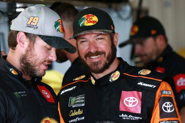TALLADEGA, ALABAMA - OCTOBER 11: Martin Truex Jr, driver of the #19 Bass Pro Shops Toyota, stands in the garage area during practice for the Monster Energy NASCAR Cup Series 1000Bulbs.com 500 at Talladega Superspeedway on October 11, 2019 in Talladega, Alabama. (Photo by Sean Gardner/Getty Images) | Getty Images