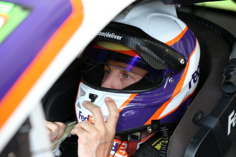 DOVER, DELAWARE - OCTOBER 04: Denny Hamlin, driver of the #11 FedEx Express Toyota, sits in his car during practice for the Monster Energy NASCAR Cup Series Drydene 400 at Dover International Speedway on October 04, 2019 in Dover, Delaware. (Photo by Matt Sullivan/Getty Images) | Getty Images