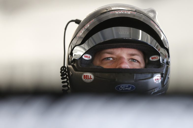 RICHMOND, VIRGINIA - SEPTEMBER 20: Brad Keselowski, driver of the #2 Discount Tire Ford, stands in the garage area during practice for the Monster Energy NASCAR Cup Series Federated Auto Parts 400 at Richmond Raceway on September 20, 2019 in Richmond, Virginia. (Photo by Brian Lawdermilk/Getty Images) | Getty Images