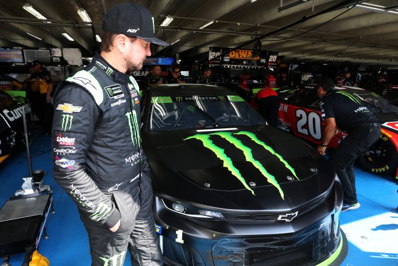 CHARLOTTE, NORTH CAROLINA - SEPTEMBER 28: Kurt Busch, driver of the #1 Monster Energy Chevrolet, stands in the garage area during practice for the Monster Energy NASCAR Cup Series Bank of America ROVAL 400 at Charlotte Motor Speedway on September 28, 2019 in Charlotte, North Carolina. (Photo by Brian Lawdermilk/Getty Images) | Getty Images