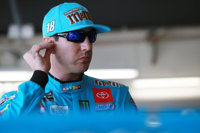 TALLADEGA, ALABAMA - OCTOBER 11: Kyle Busch, driver of the #18 M&M's Hazelnut Toyota, stands in the garage area during practice for the Monster Energy NASCAR Cup Series 1000Bulbs.com 500 at Talladega Superspeedway on October 11, 2019 in Talladega, Alabama. (Photo by Sean Gardner/Getty Images) | Getty Images
