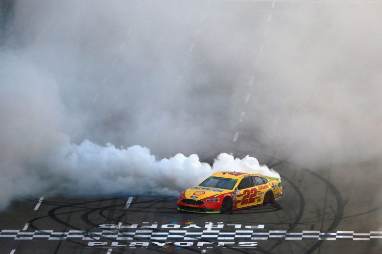 MARTINSVILLE, VA - OCTOBER 28: Joey Logano, driver of the #22 Shell Pennzoil Ford, celebrates with a burnout after winning the Monster Energy NASCAR Cup Series First Data 500 at Martinsville Speedway on October 28, 2018 in Martinsville, Virginia. (Photo by Sean Gardner/Getty Images) | Getty Images