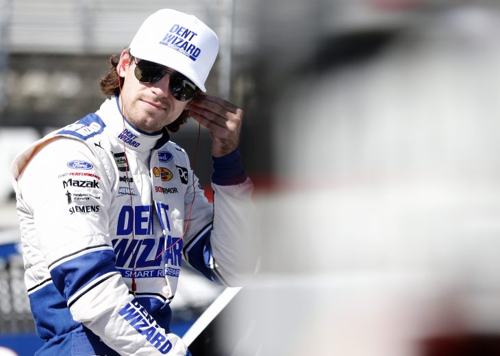 BRISTOL, TENNESSEE - AUGUST 16: Ryan Blaney, driver of the #12 Dent Wizard Ford, stands in the garage during practice for the Monster Energy NASCAR Cup Series Bass Pro Shops NRA Night Race at Bristol Motor Speedway on August 16, 2019 in Bristol, Tennessee. (Photo by Brian Lawdermilk/Getty Images) | Getty Images