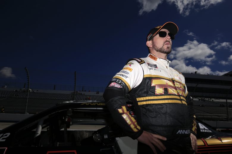 DOVER, DELAWARE - OCTOBER 05: Michael Annett, driver of the #1 TMC Transportation Chevrolet, stands on the grid during qualifying for the NASCAR Xfinity Series Use Your Melon Drive Sober 200 at Dover International Speedway on October 05, 2019 in Dover, Delaware. (Photo by Chris Trotman/Getty Images) | Getty Images