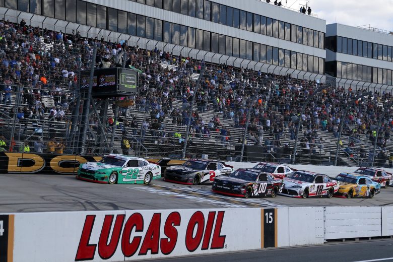 DOVER, DELAWARE - OCTOBER 05: Austin Cindric, driver of the #22 MoneyLion Ford, and Cole Custer, driver of the #00 Production Alliance Group Ford, take the green flag to start the NASCAR Xfinity Series Use Your Melon Drive Sober 200 at Dover International Speedway on October 05, 2019 in Dover, Delaware. (Photo by Matt Sullivan/Getty Images) | Getty Images