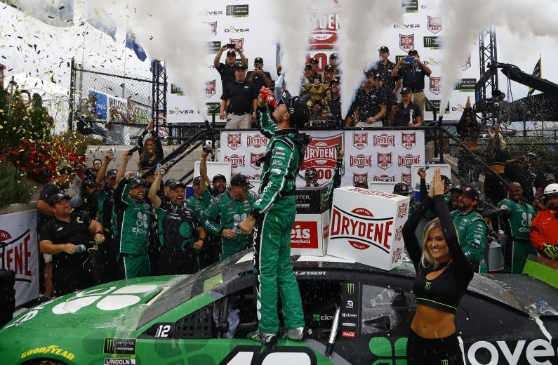 DOVER, DELAWARE - OCTOBER 06: Kyle Larson, driver of the #42 Clover Chevrolet, celebrates in Victory Lane after winning the Monster Energy NASCAR Cup Series Drydene 400 at Dover International Speedway on October 06, 2019 in Dover, Delaware. (Photo by Jeff Zelevansky/Getty Images)