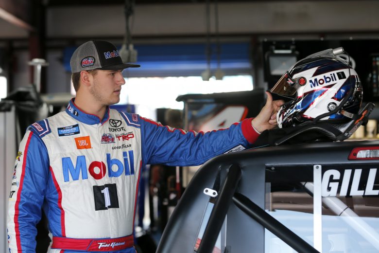 TALLADEGA, ALABAMA - OCTOBER 11: Todd Gilliland, driver of the #4 Mobil 1 Toyota, stands in the garage area during practice for the NASCAR Gander Outdoor Truck Series Sugarlands Shine 250 at Talladega Superspeedway on October 11, 2019 in Talladega, Alabama. (Photo by Brian Lawdermilk/Getty Images) | Getty Images