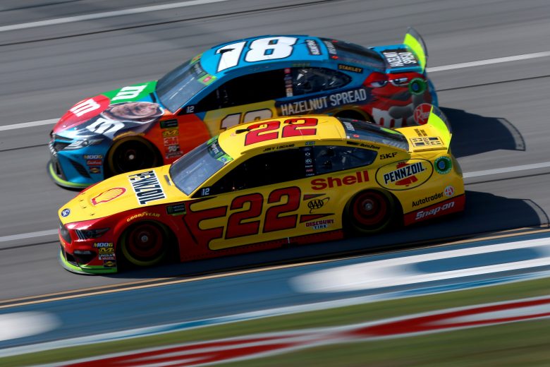 TALLADEGA, ALABAMA - OCTOBER 11: Joey Logano, driver of the #22 Shell Pennzoil Ford, and Kyle Busch, driver of the #18 M&M's Hazelnut Toyota, practice for the Monster Energy NASCAR Cup Series 1000Bulbs.com 500 at Talladega Superspeedway on October 11, 2019 in Talladega, Alabama. (Photo by Sean Gardner/Getty Images) | Getty Images