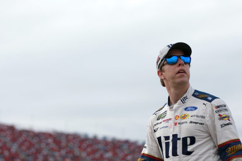 TALLADEGA, ALABAMA - OCTOBER 12: Brad Keselowski, driver of the #2 Miller Lite Ford, stands on the grid during qualifying for the Monster Energy NASCAR Cup Series 1000Bulbs.com 500 at Talladega Superspeedway on October 12, 2019 in Talladega, Alabama. (Photo by Sean Gardner/Getty Images) | Getty Images