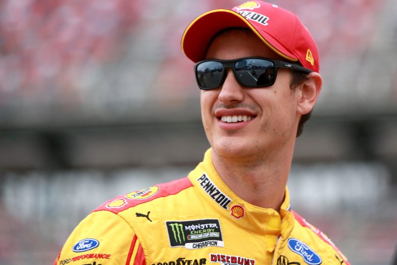 TALLADEGA, ALABAMA - OCTOBER 12: Joey Logano, driver of the #22 Shell Pennzoil Ford, stands on the grid during qualifying for the Monster Energy NASCAR Cup Series 1000Bulbs.com 500 at Talladega Superspeedway on October 12, 2019 in Talladega, Alabama. (Photo by Sean Gardner/Getty Images) | Getty Images