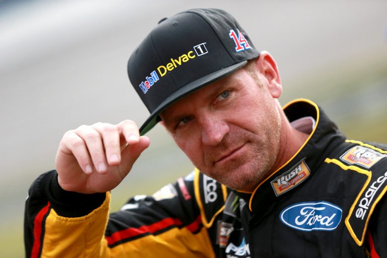 TALLADEGA, ALABAMA - OCTOBER 12: Clint Bowyer, driver of the #14 Rush/Mobil Delvac 1 Ford, stands on the grid during qualifying for the Monster Energy NASCAR Cup Series 1000Bulbs.com 500 at Talladega Superspeedway on October 12, 2019 in Talladega, Alabama. (Photo by Sean Gardner/Getty Images) | Getty Images