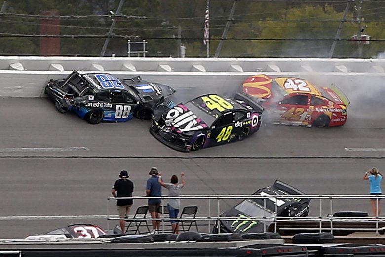 TALLADEGA, ALABAMA - OCTOBER 14: Alex Bowman, driver of the #88 Nationwide/Amazon Echo Auto Chevrolet, Kyle Larson, driver of the #42 McDonald's Chevrolet, and Jimmie Johnson, driver of the #48 Ally Chevrolet, wreck during the Monster Energy NASCAR Cup Series 1000Bulbs.com 500 at Talladega Superspeedway on October 14, 2019 in Talladega, Alabama. (Photo by Brian Lawdermilk/Getty Images) | Getty Images