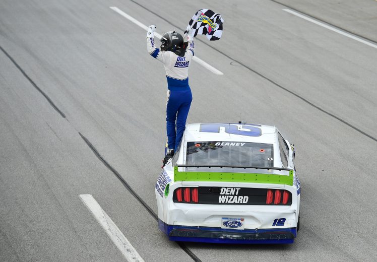 TALLADEGA, ALABAMA - OCTOBER 14: Ryan Blaney, driver of the #12 Dent Wizard Ford, celebrates winning the Monster Energy NASCAR Cup Series 1000Bulbs.com 500 at Talladega Superspeedway on October 14, 2019 in Talladega, Alabama. (Photo by Jared C. Tilton/Getty Images) | Getty Images