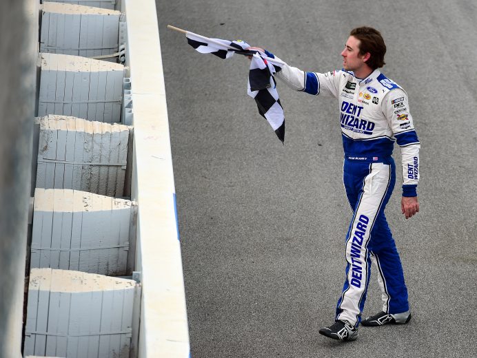 TALLADEGA, ALABAMA - OCTOBER 14: Ryan Blaney, driver of the #12 Dent Wizard Ford, celebrates winning the Monster Energy NASCAR Cup Series 1000Bulbs.com 500 at Talladega Superspeedway on October 14, 2019 in Talladega, Alabama. (Photo by Jared C. Tilton/Getty Images) | Getty Images