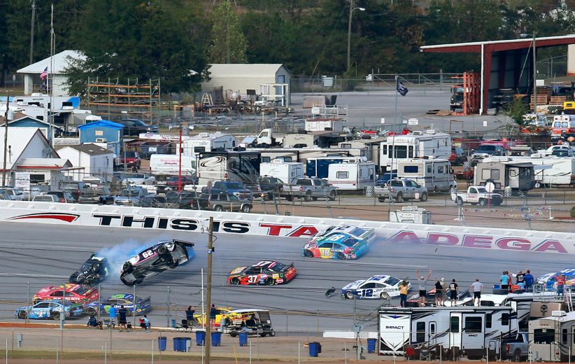 TALLADEGA, ALABAMA - OCTOBER 14: Brendan Gaughan, driver of the #62 BeardOilDistributing/SouthPointHotel&Casino Chevrolet, flips upside down during the Monster Energy NASCAR Cup Series 1000Bulbs.com 500 at Talladega Superspeedway on October 14, 2019 in Talladega, Alabama. (Photo by Sean Gardner/Getty Images) | Getty Images