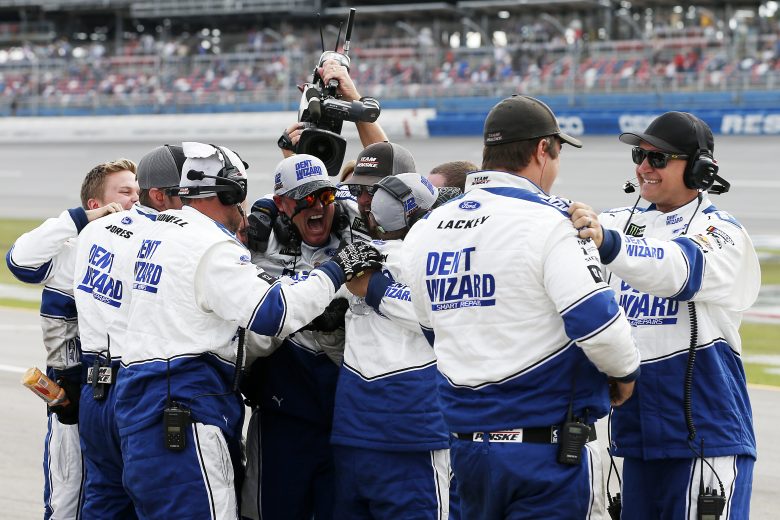 TALLADEGA, ALABAMA - OCTOBER 14: The team of Ryan Blaney, driver of the #12 Dent Wizard Ford, celebrates after winning the Monster Energy NASCAR Cup Series 1000Bulbs.com 500 at Talladega Superspeedway on October 14, 2019 in Talladega, Alabama. (Photo by Brian Lawdermilk/Getty Images) | Getty Images