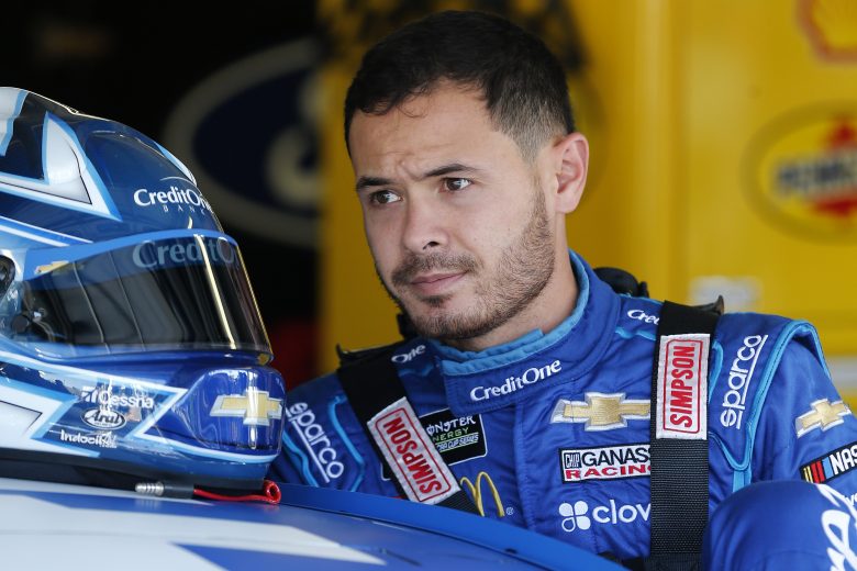 KANSAS CITY, KANSAS - OCTOBER 18: Kyle Larson, driver of the #42 Credit One Bank Chevrolet, climbs into his car during practice for the Monster Energy NASCAR Cup Series Hollywood Casino 400 at Kansas Speedway on October 18, 2019 in Kansas City, Kansas. (Photo by Brian Lawdermilk/Getty Images) | Getty Images