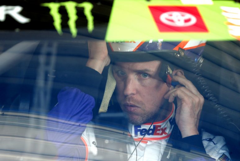 KANSAS CITY, KANSAS - OCTOBER 18: Denny Hamlin, driver of the #11 FedEx Office Toyota, sits in his car during practice for the Monster Energy NASCAR Cup Series Hollywood Casino 400 at Kansas Speedway on October 18, 2019 in Kansas City, Kansas. (Photo by Brian Lawdermilk/Getty Images) | Getty Images