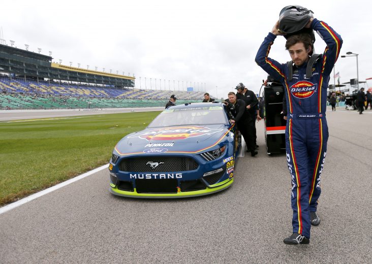 KANSAS CITY, KANSAS - OCTOBER 19: Ryan Blaney, driver of the #12 Menards/Dickies Ford, prepares during qualifying for the Monster Energy NASCAR Cup Series Hollywood Casino 400 at Kansas Speedway on October 19, 2019 in Kansas City, Kansas. (Photo by Jonathan Ferrey/Getty Images) | Getty Images