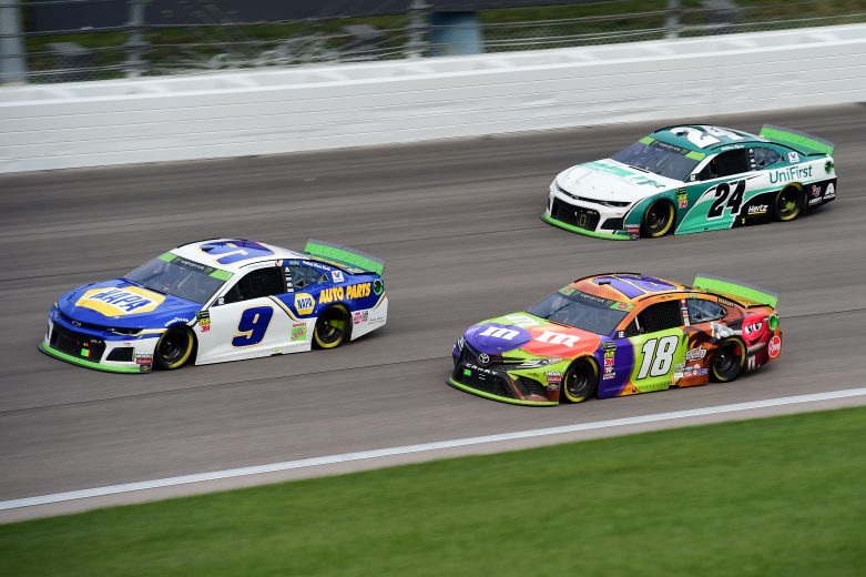 KANSAS CITY, KANSAS - OCTOBER 20: Chase Elliott, driver of the #9 NAPA Auto Parts Chevrolet, leads Kyle Busch, driver of the #18 M&M's Halloween Toyota, and William Byron, driver of the #24 UniFirst Chevrolet, during the Monster Energy NASCAR Cup Series Hollywood Casino 400 at Kansas Speedway on October 20, 2019 in Kansas City, Kansas. (Photo by Jared C. Tilton/Getty Images) | Getty Images