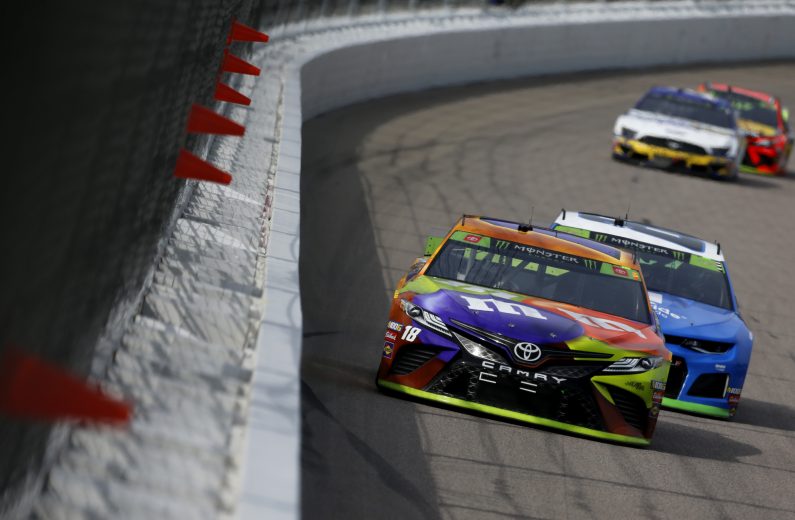 KANSAS CITY, KANSAS - OCTOBER 20: Kyle Busch, driver of the #18 M&M's Halloween Toyota, leads a pack of cars during the Monster Energy NASCAR Cup Series Hollywood Casino 400 at Kansas Speedway on October 20, 2019 in Kansas City, Kansas. (Photo by Jonathan Ferrey/Getty Images) | Getty Images