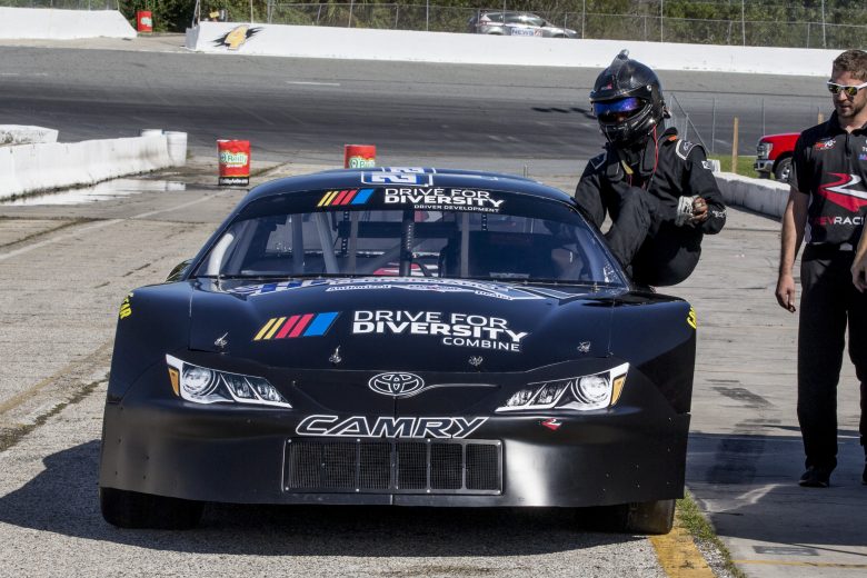 NEW SMYRNA BEACH, FLORIDA - OCTOBER 23:   Rajah Caruth climbs into his car, NASCAR Drive for Diversity Combine at New Smyrna Speedway on October 23, 2019 in New Smyrna Beach, Florida. (Photo by Brian Cleary/Getty Images) | Getty Images