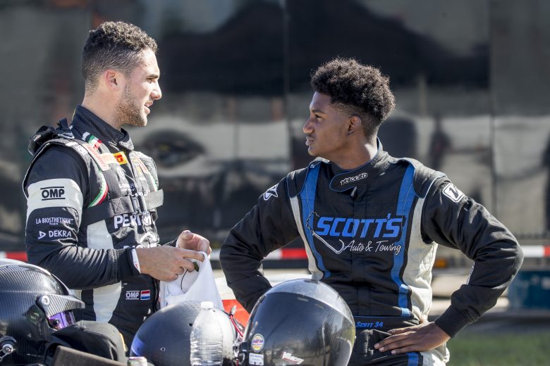 NEW SMYRNA BEACH, FLORIDA - OCTOBER 23:   Loris Hezemans, L, and Lavar Scott,  NASCAR Drive for Diversity Combine at New Smyrna Speedway on October 23, 2019 in New Smyrna Beach, Florida. (Photo by Brian Cleary/Getty Images)